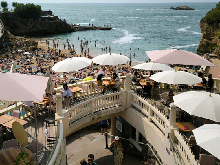 Biarritz coastline with festive crowd